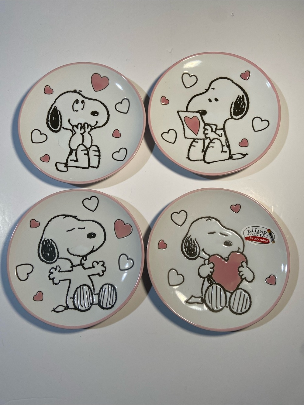 Set of four 6-inch hand-painted ceramic Peanuts Snoopy Snack Plates NWOT